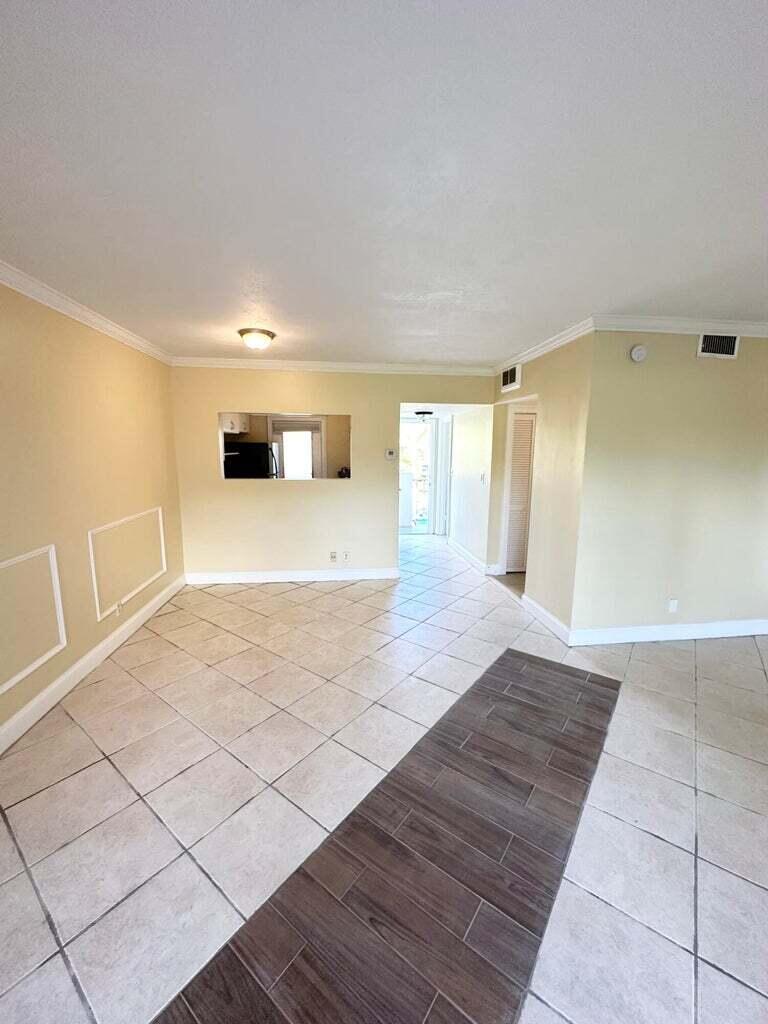 5601 Northwest 2nd Avenue, Unit 217 Boca Raton, FL 33487 - Photo 19 of 42 living dining room