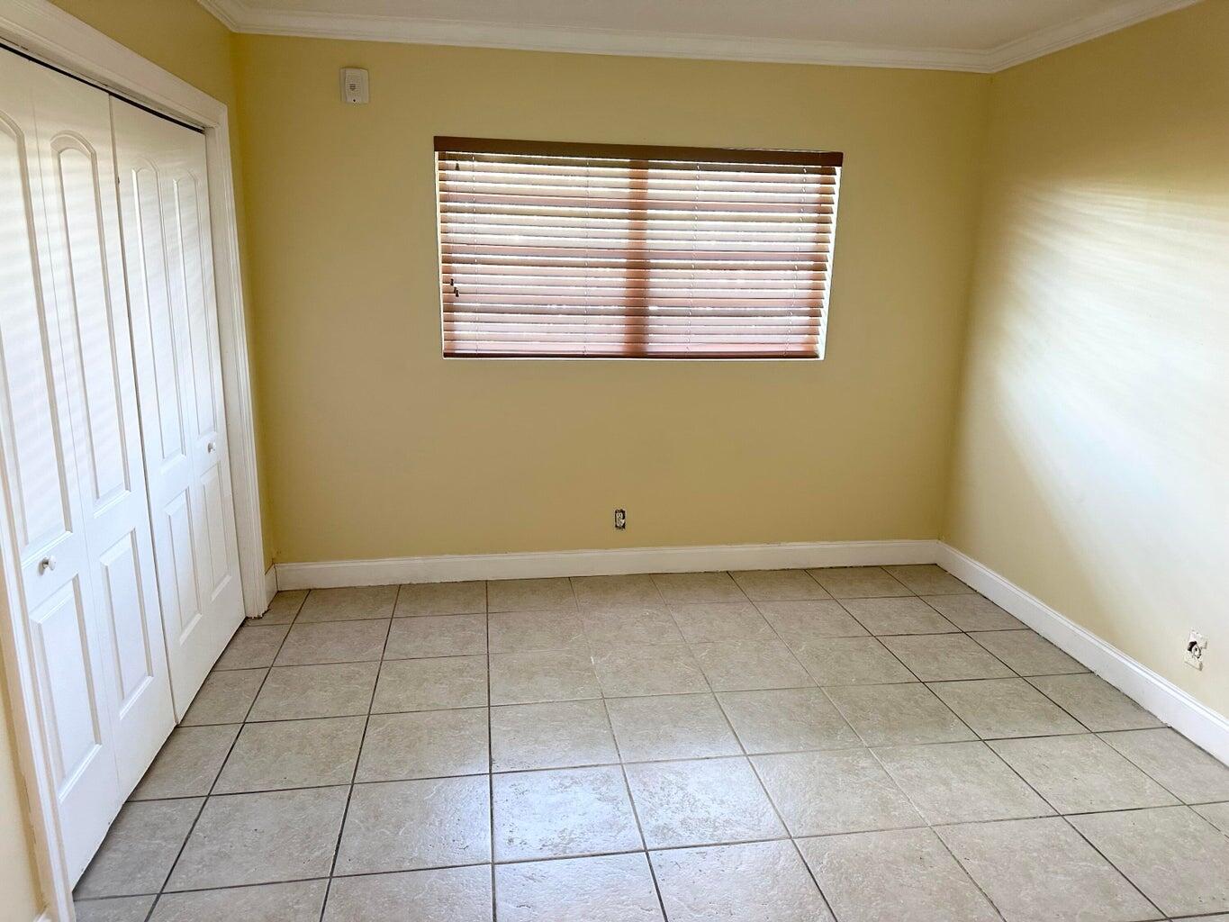 5601 Northwest 2nd Avenue, Unit 217 Boca Raton, FL 33487 - Photo 22 of 42 Primary bedroom