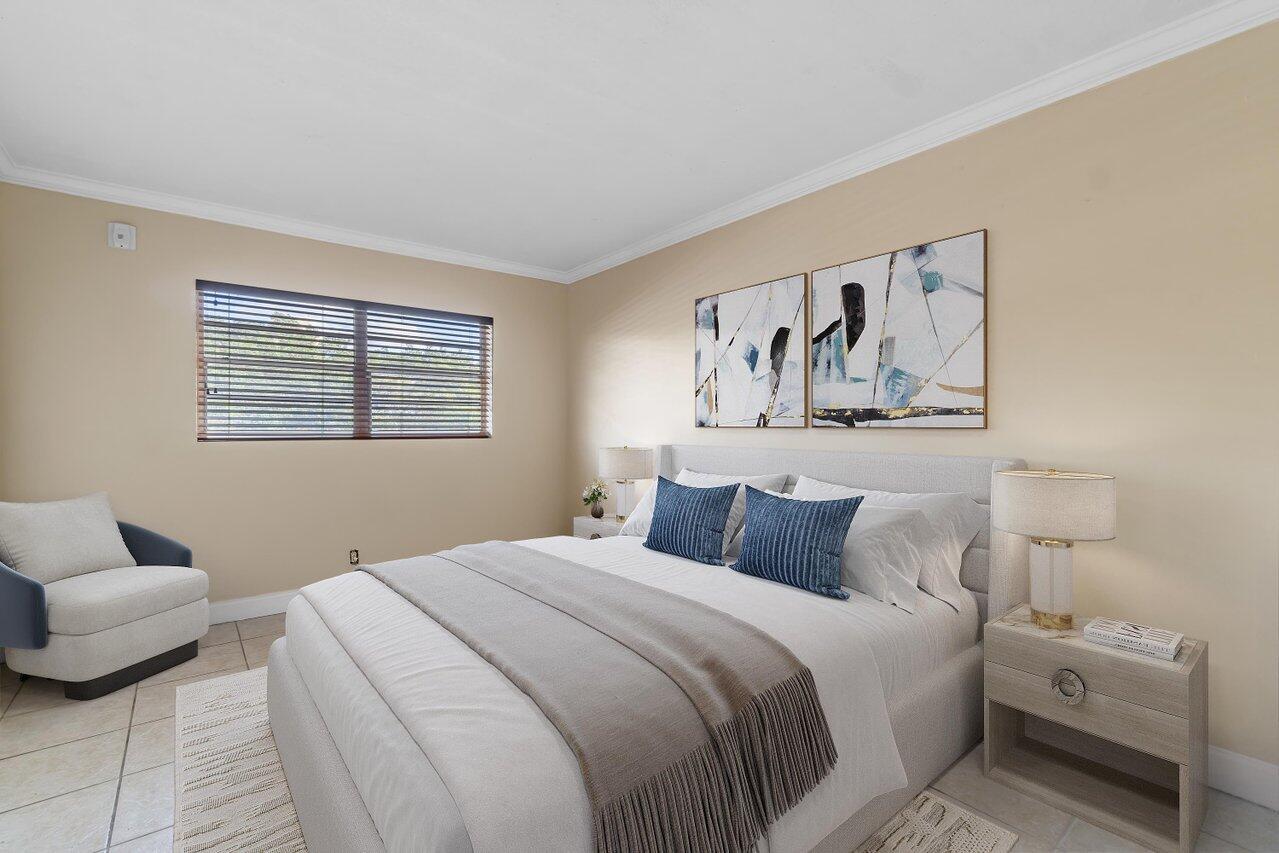 5601 Northwest 2nd Avenue, Unit 217 Boca Raton, FL 33487 - Photo 10 of 42 Primary bedroom