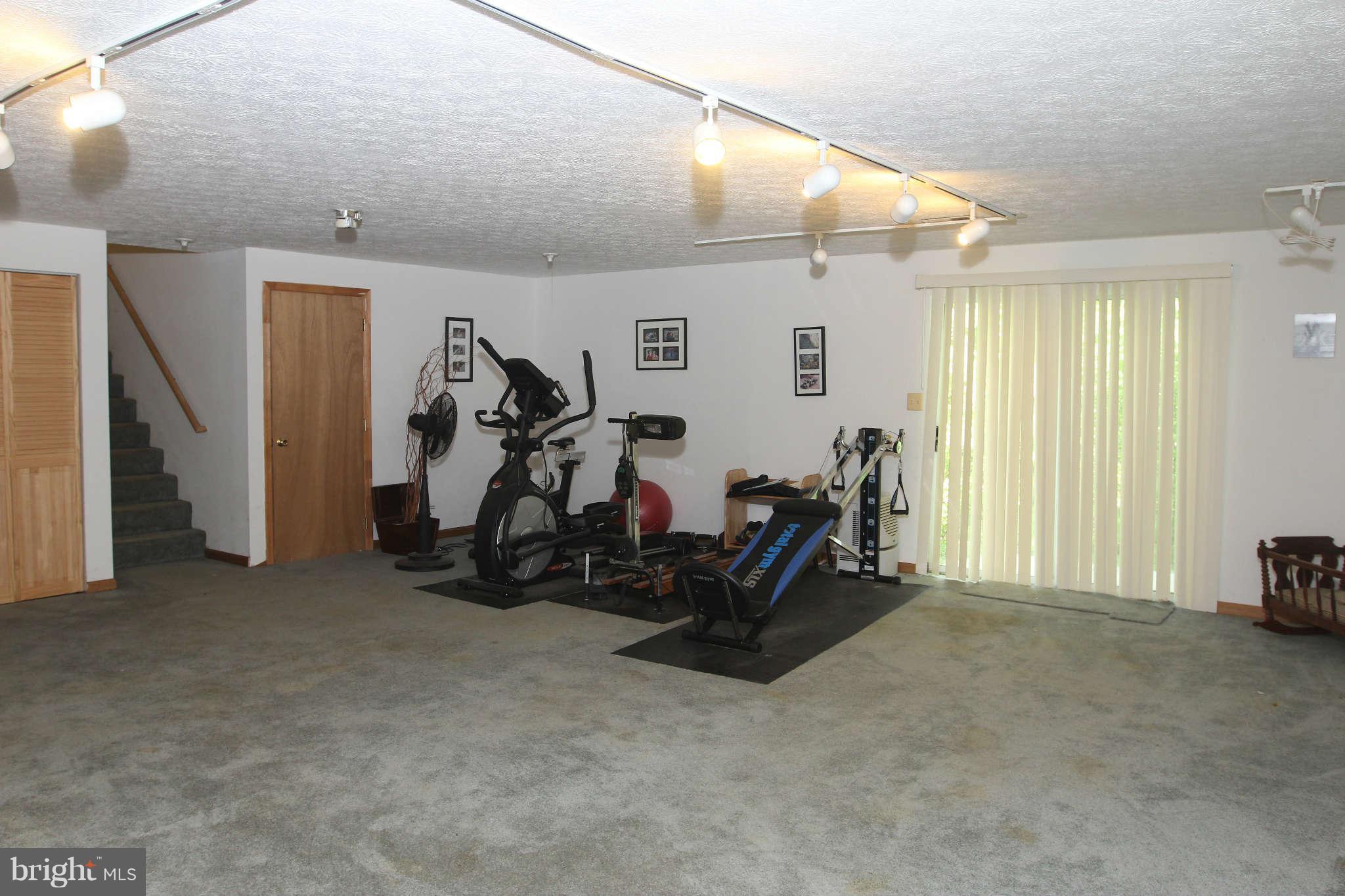 467 Redwood Road Lusby, MD 20657 - Photo 14 of 20 a view of a room with gym equipment