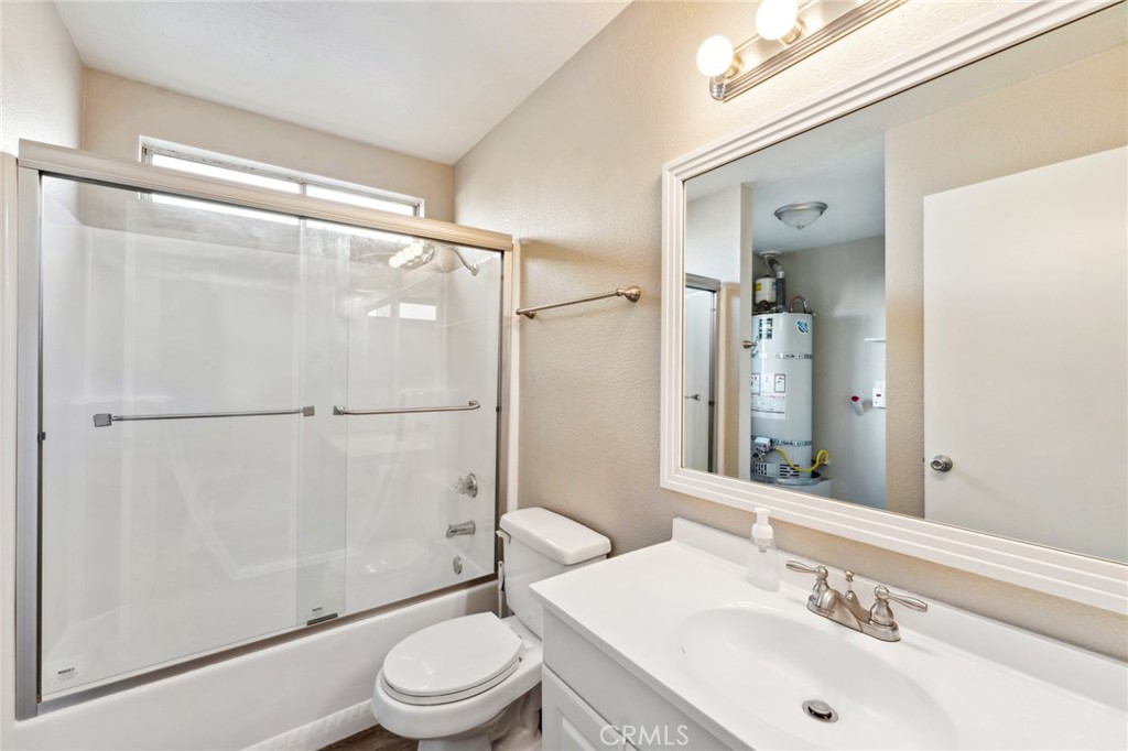 34602 Calle Rosita, Unit A Dana Point, CA 92624 - Photo 18 of 27 a bathroom with a sink toilet and shower