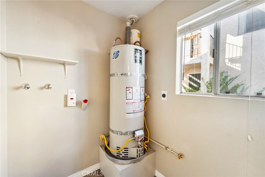 34602 Calle Rosita, Unit A Dana Point, CA 92624 - Photo 19 of 27 a bathroom with a sink a toilet and a window
