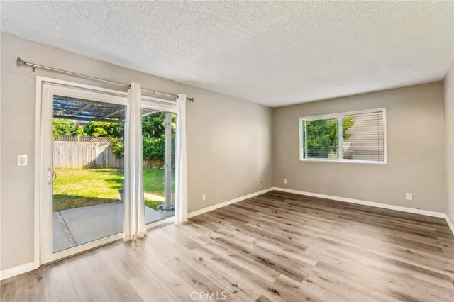a view of an empty room and window