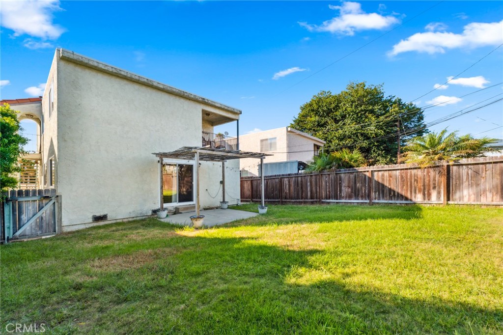 34602 Calle Rosita, Unit A Dana Point, CA 92624 - Photo 25 of 27 a view of a backyard with swimming pool