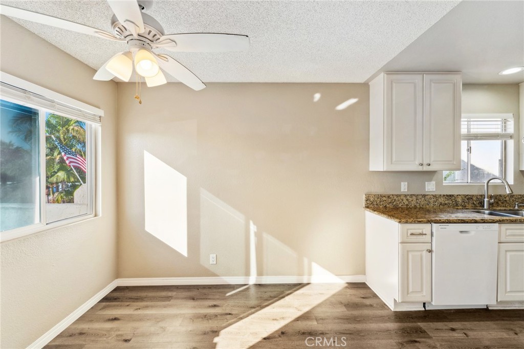 34602 Calle Rosita, Unit A Dana Point, CA 92624 - Photo 7 of 27 a view of a kitchen with marble kitchen and kitchen area