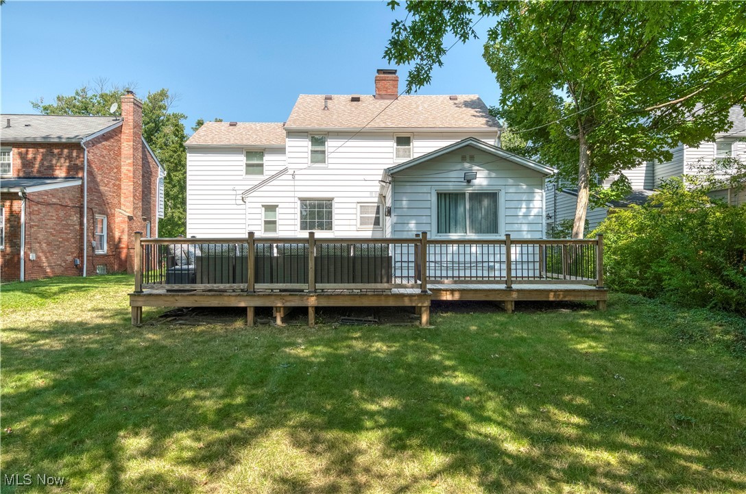 4520 Birchwold Road Cleveland, OH 44121 - Photo 39 of 40 Back of house with yard and a wooden deck