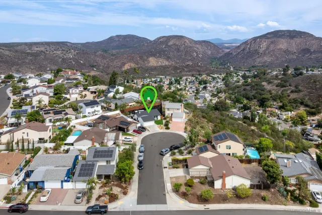 an aerial view of a city with lots of residential buildings