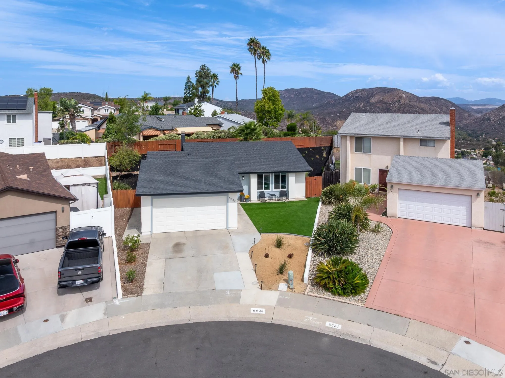 6832 Lazy Clouds San Diego, CA 92120 - Photo 4 of 45 aerial view of a house with a yard
