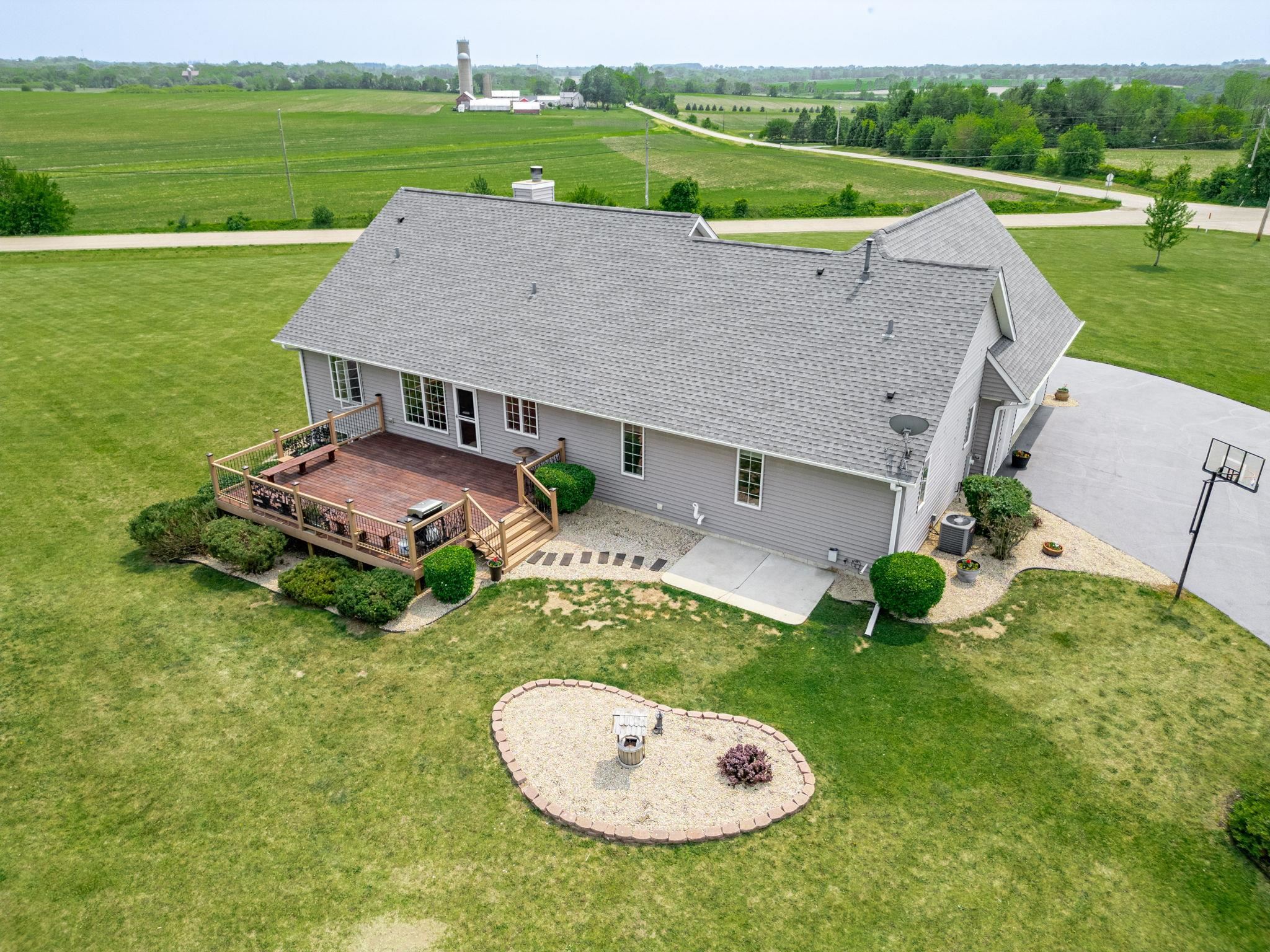 3535 North Keith Road Pecatonica, IL 61063 - Photo 38 of 47 an aerial view of a house with pool and a garden