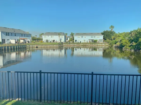 a view of a lake from a balcony