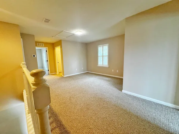 a view of livingroom and workspace