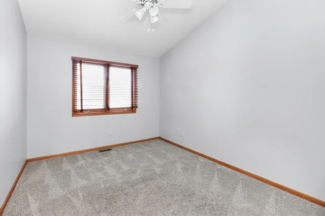 a bathroom with a sink a toilet and bathtub
