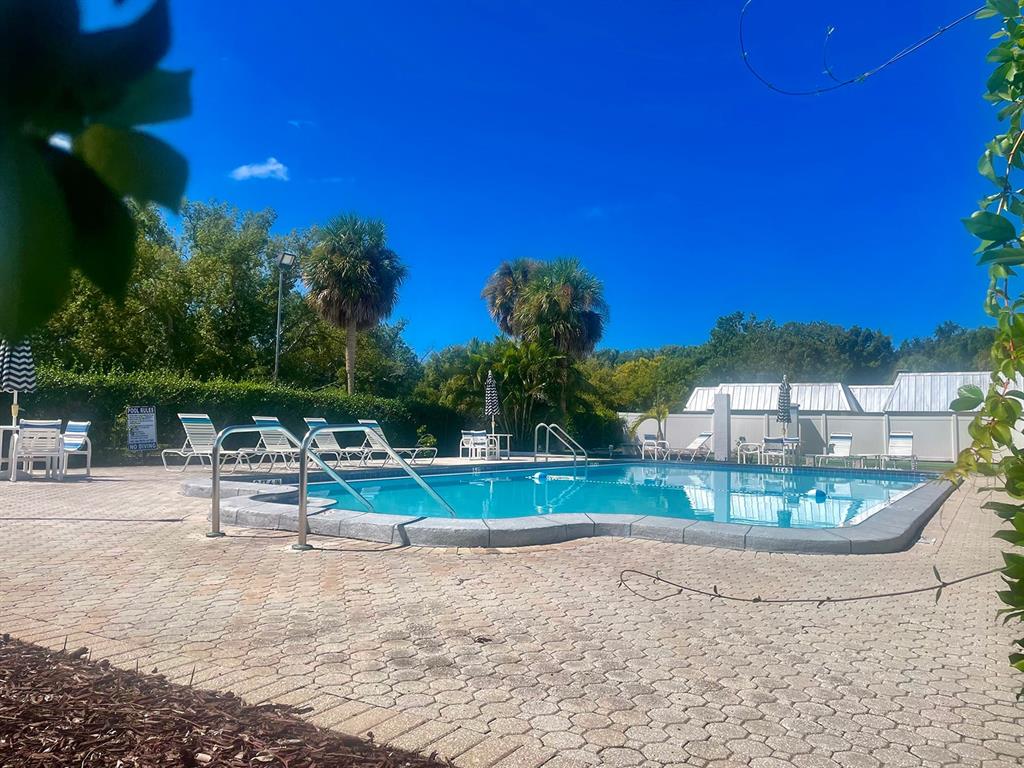 4211 Sheldon Place, Unit 4211 New Port Richey, FL 34652 - Photo 25 of 58 a view of outdoor space and yard