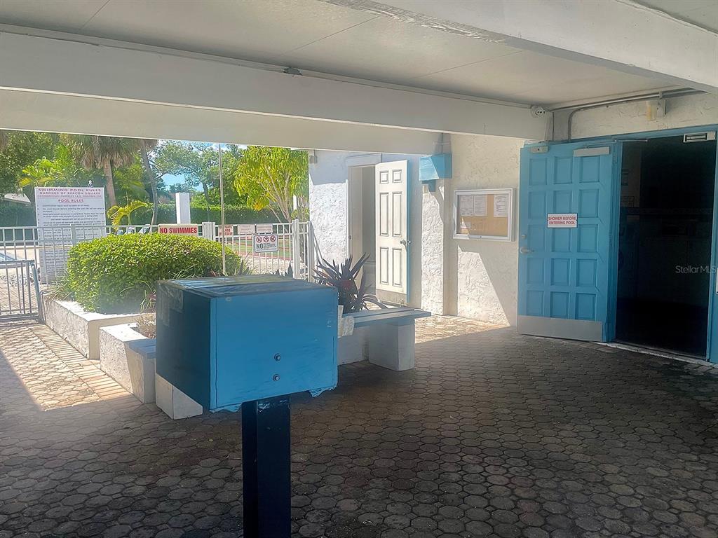 4211 Sheldon Place, Unit 4211 New Port Richey, FL 34652 - Photo 28 of 58 a living room with a fireplace furniture and a large window