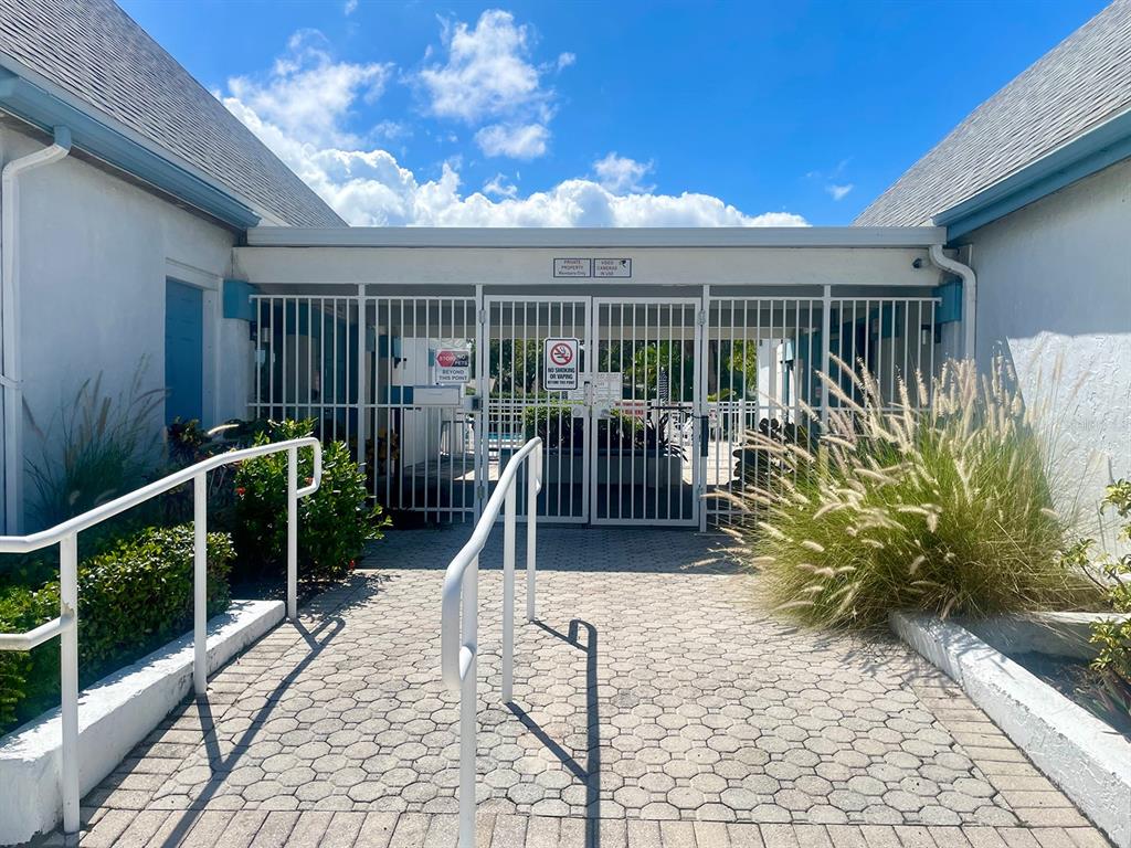 4211 Sheldon Place, Unit 4211 New Port Richey, FL 34652 - Photo 31 of 58 a view of a balcony with chairs