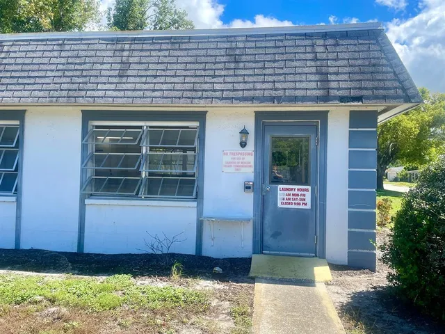 a view of a refrigerator and washer