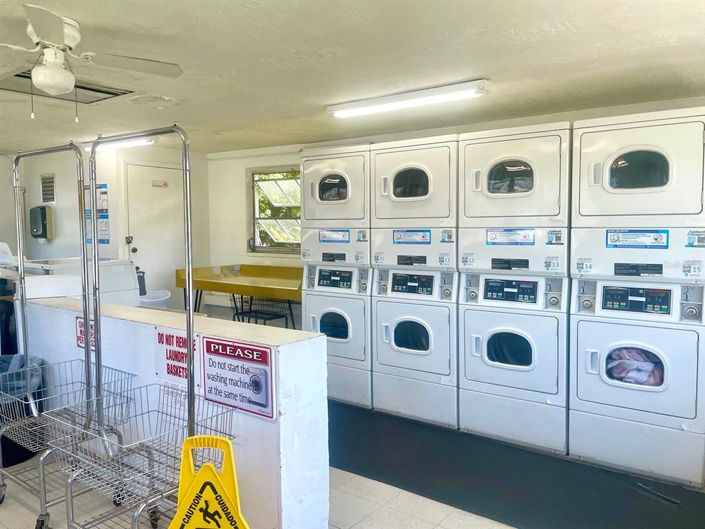 4211 Sheldon Place, Unit 4211 New Port Richey, FL 34652 - Photo 40 of 58 a view of a refrigerator and washer