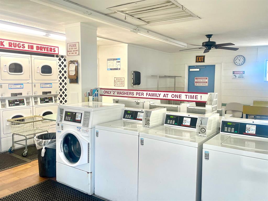 4211 Sheldon Place, Unit 4211 New Port Richey, FL 34652 - Photo 41 of 58 a utility room with dryer and washer