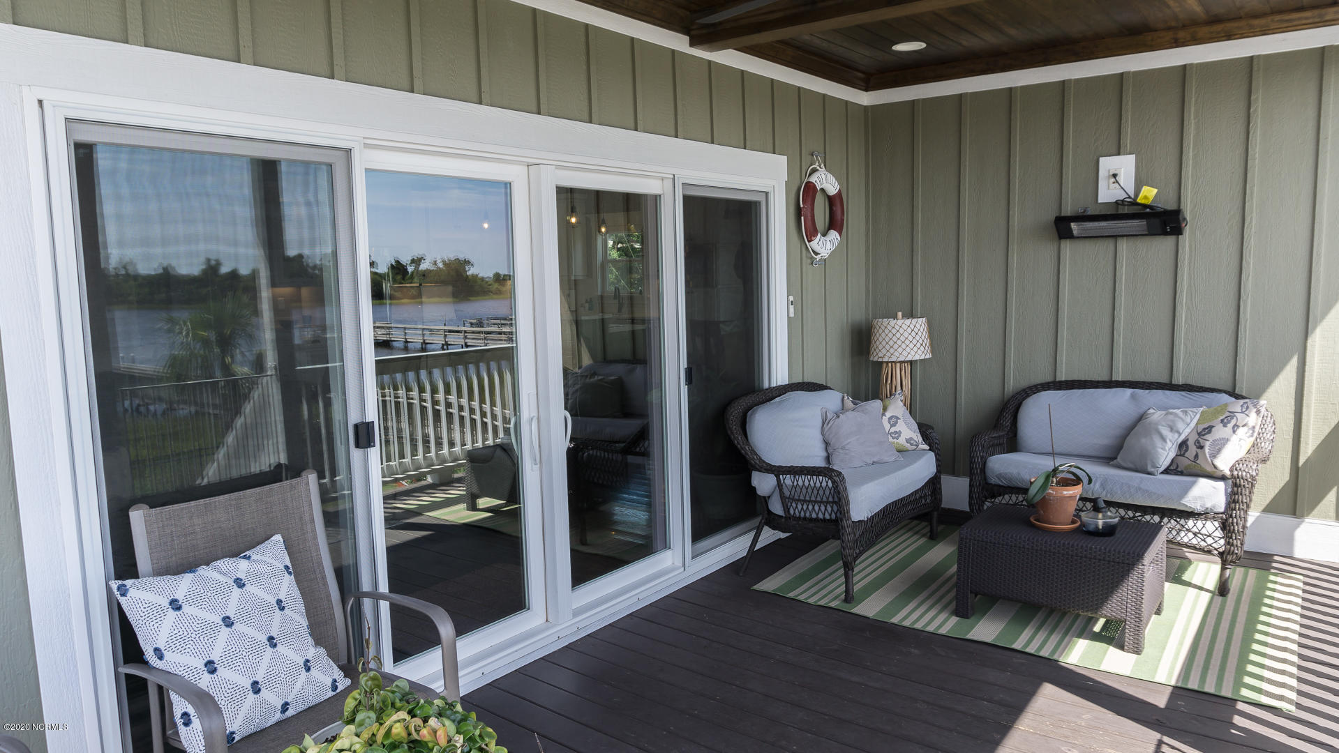 7005 Lester Street Southwest Ocean Isle Beach, NC 28469 - Photo 28 of 71 Relaxing covered porch