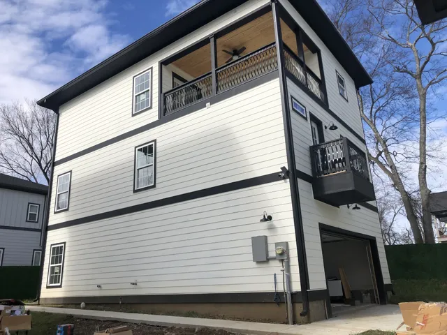 a view of a house with a garage