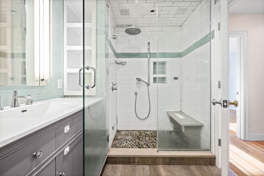 36 Cummings Road, Unit 10 Boston, MA 02135 - Photo 5 of 17 a bathroom with a shower and a sink