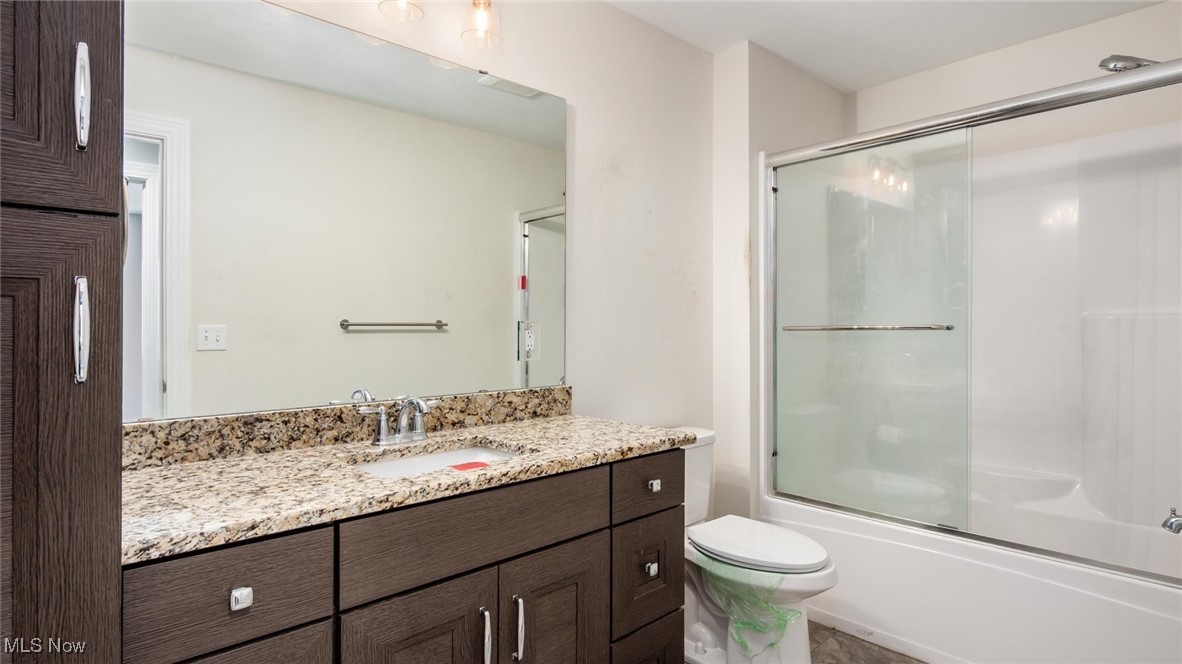 4641 Foote Road Medina, OH 44256 - Photo 31 of 46 Full bathroom featuring vanity and shower / bath combination with glass door