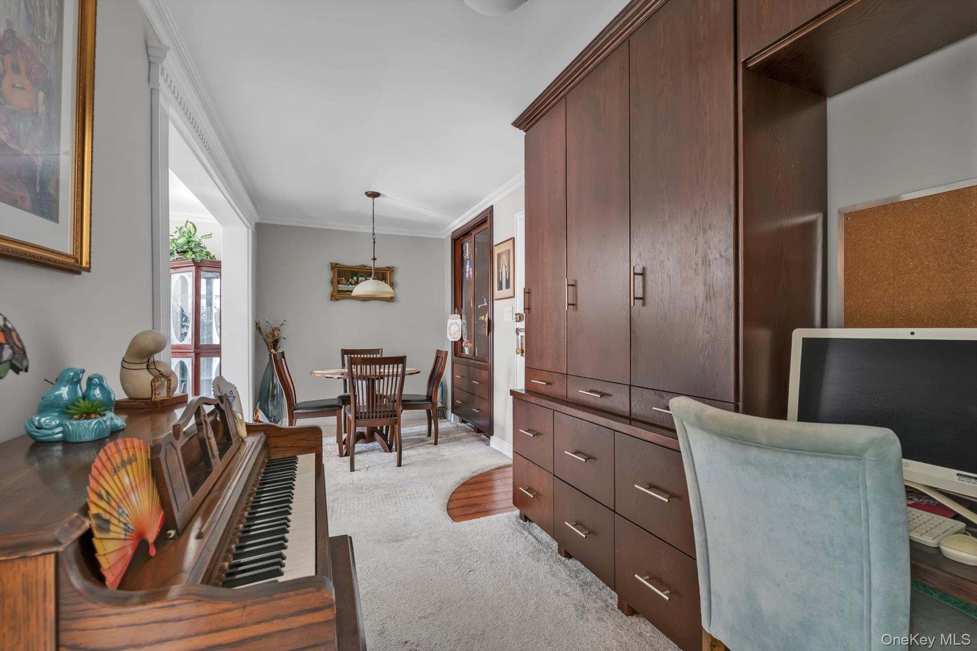 83-25 98th Street, Unit 4L Queens, NY 11421 - Photo 10 of 14 Office with crown molding and light carpet