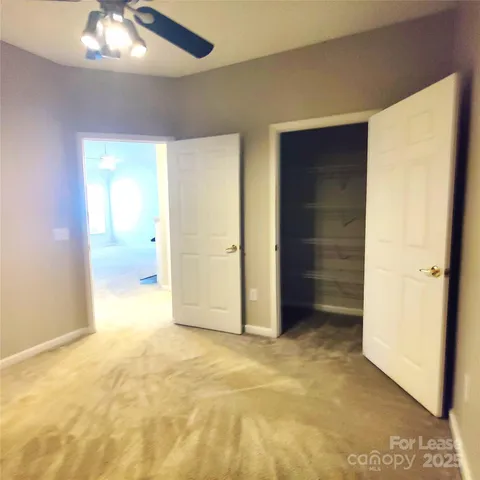 an empty room with a bathroom