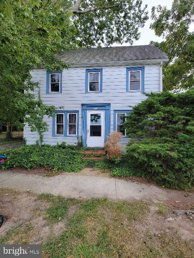 312 Front Street Dover, DE 19901 - Photo 3 of 15 a front view of a house with garden