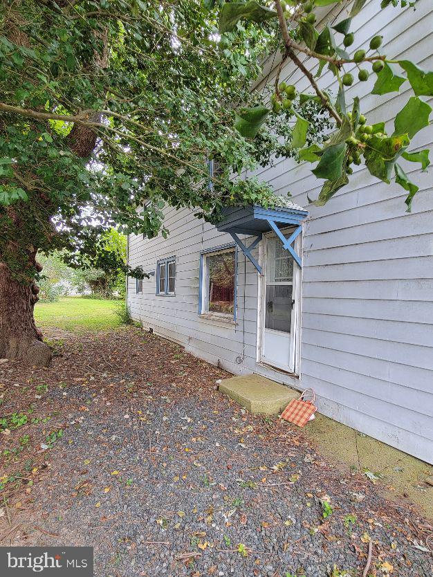 312 Front Street Dover, DE 19901 - Photo 5 of 15 a view of a house with a tree in the background