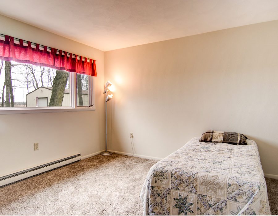 11808 Wheeler Road Durand, IL 61024 - Photo 16 of 25 a bedroom with a bed and a window