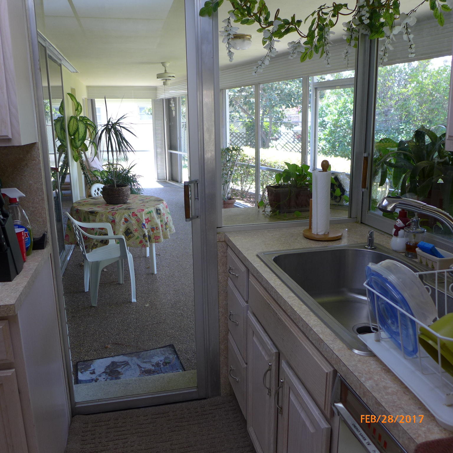 1099 Southwest 12th Avenue Boca Raton, FL 33486 - Photo 13 of 14 a kitchen with a sink and large window