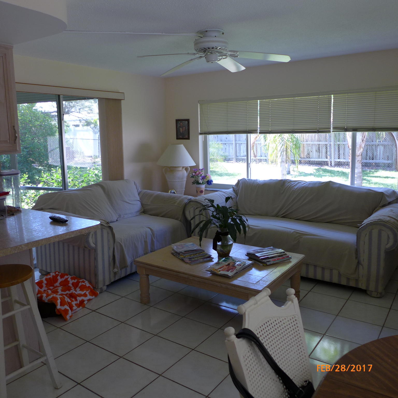 1099 Southwest 12th Avenue Boca Raton, FL 33486 - Photo 6 of 14 a living room with furniture and a table