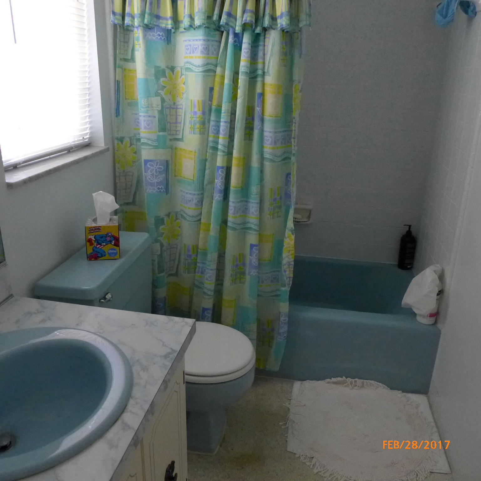 1099 Southwest 12th Avenue Boca Raton, FL 33486 - Photo 8 of 14 a bathroom with a sink a toilet and shower