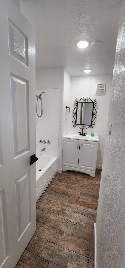 3499 East Bayshore Road, Unit 86 Redwood City, CA 94063 - Photo 20 of 21 a bathroom with a sink a bathtub and mirror