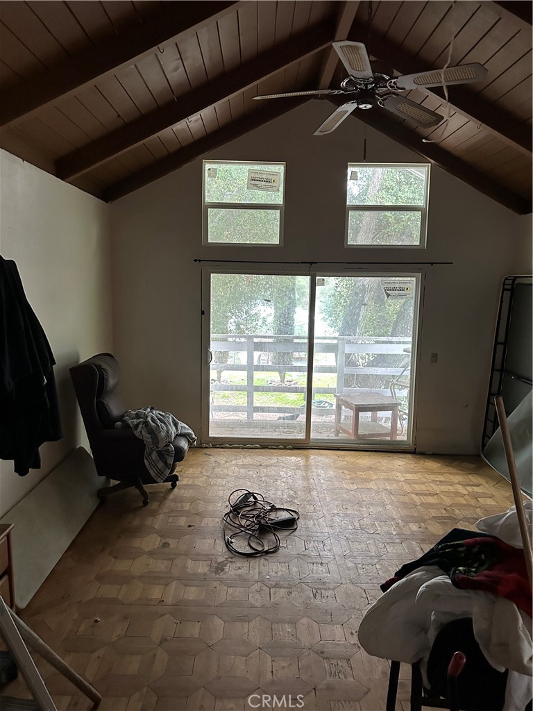 34930 East Benton Road Hemet, CA 92544 - Photo 25 of 54 a living room with furniture and a floor to ceiling window