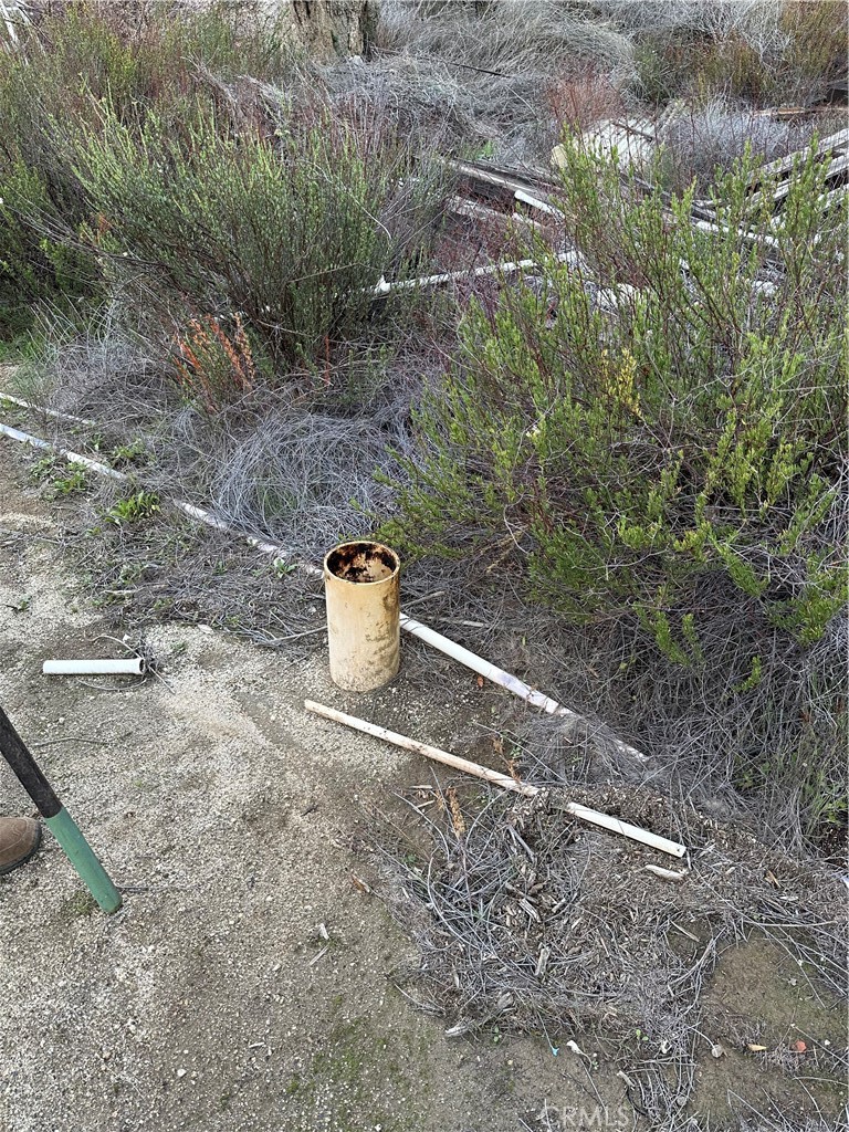 34930 East Benton Road Hemet, CA 92544 - Photo 34 of 54 a view of a tiny house with a yard