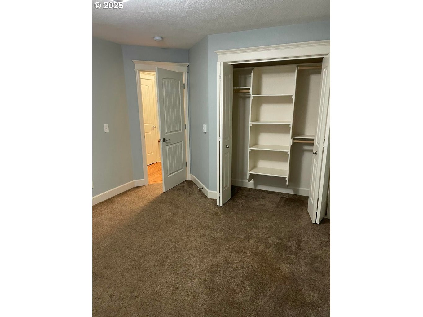 409 Evergreen Avenue Garibaldi, OR 97118 - Photo 12 of 48 a view of an empty room with closet and a window