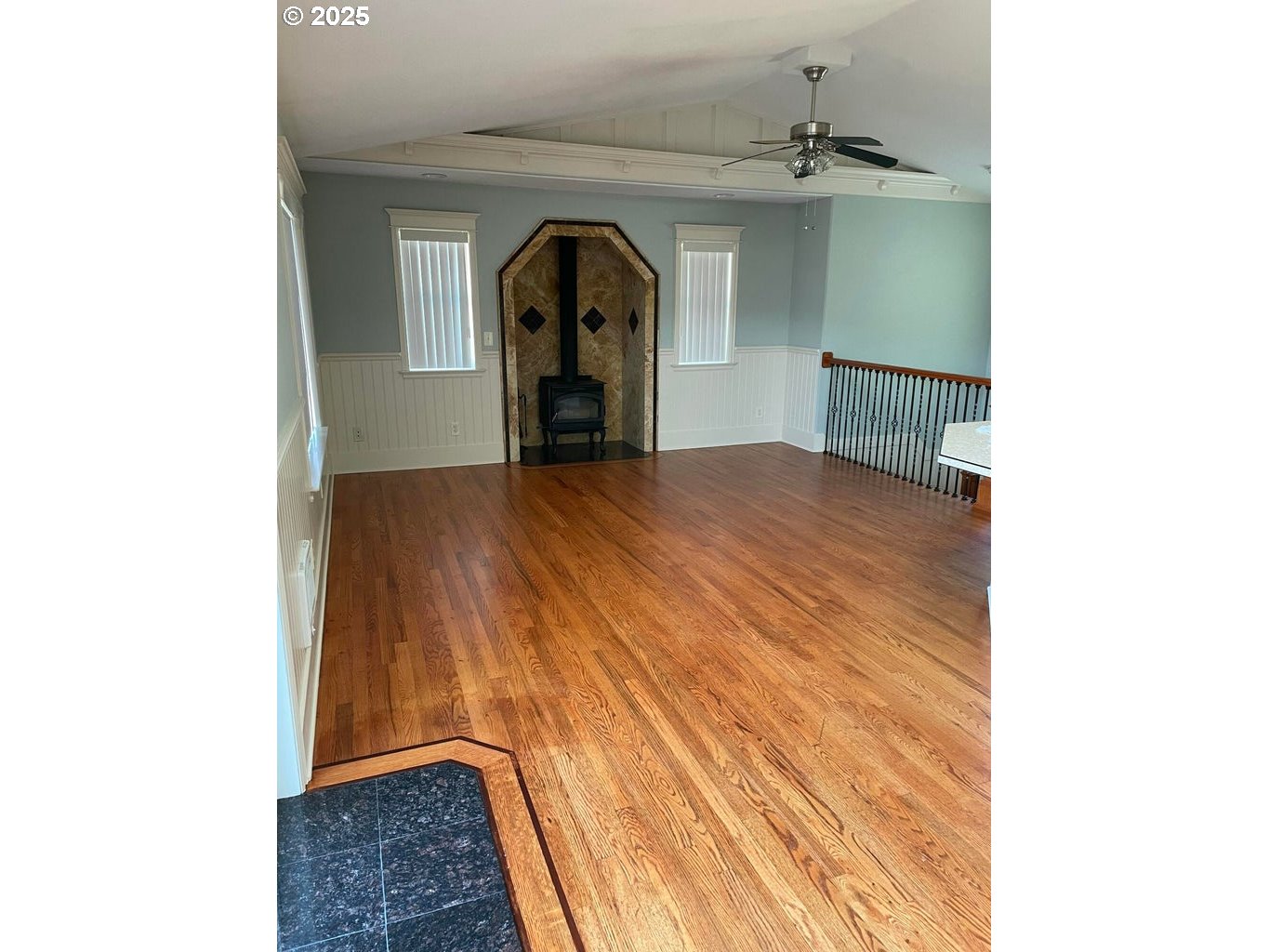 409 Evergreen Avenue Garibaldi, OR 97118 - Photo 14 of 48 a view of empty room with wooden floor