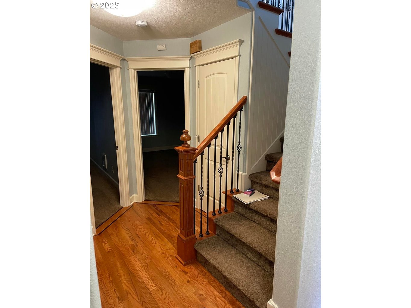 409 Evergreen Avenue Garibaldi, OR 97118 - Photo 3 of 48 a view of a hallway with wooden floor