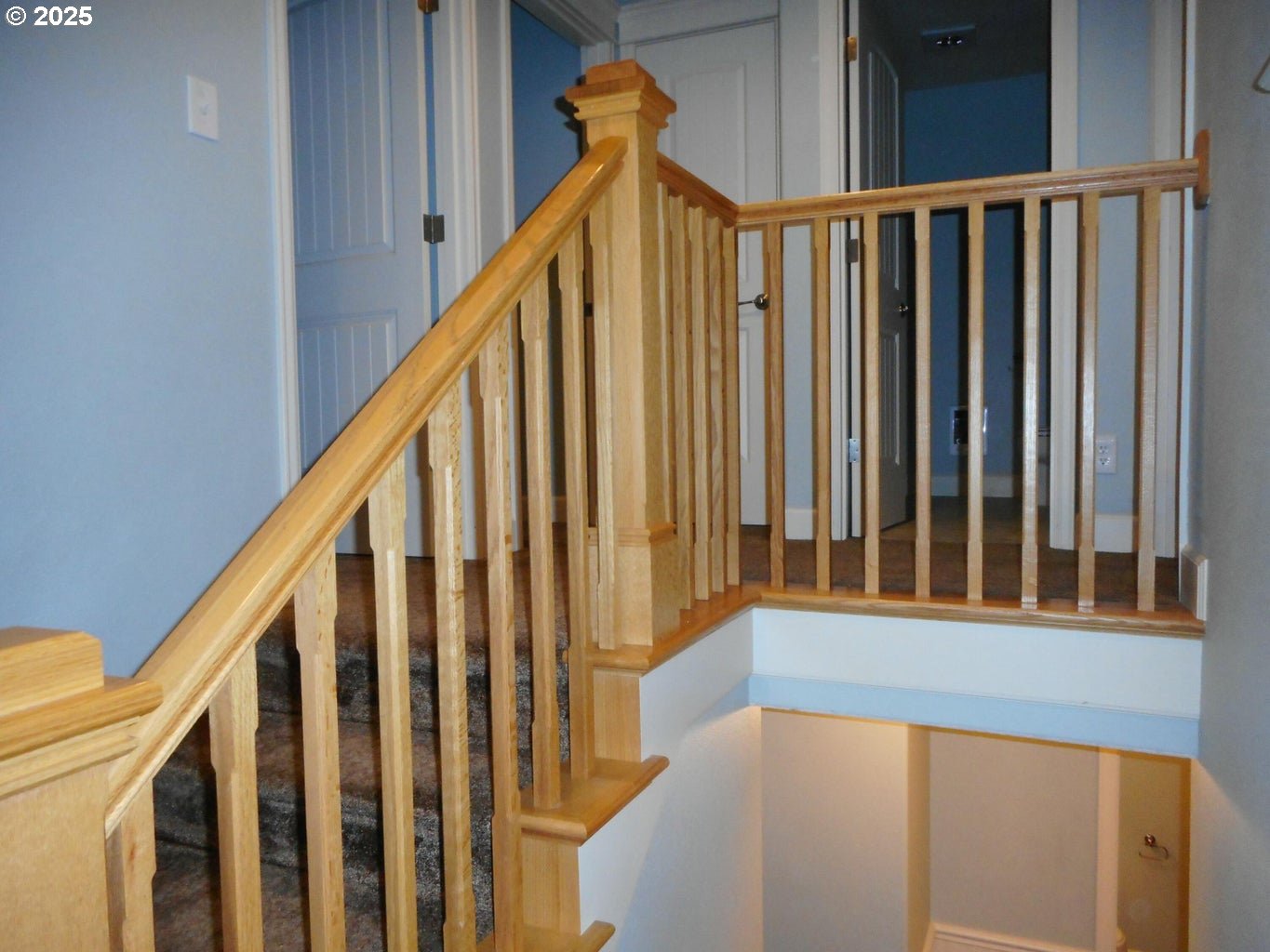 409 Evergreen Avenue Garibaldi, OR 97118 - Photo 41 of 48 a view of staircase with railing and white walls
