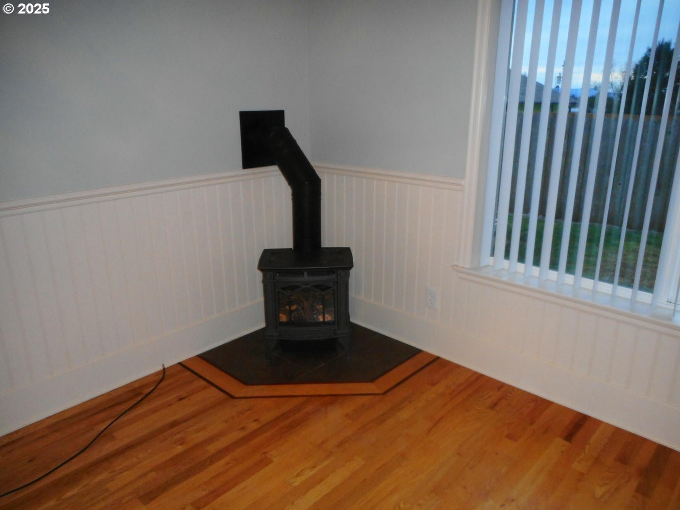 409 Evergreen Avenue Garibaldi, OR 97118 - Photo 44 of 48 a view of an empty room with wooden floor
