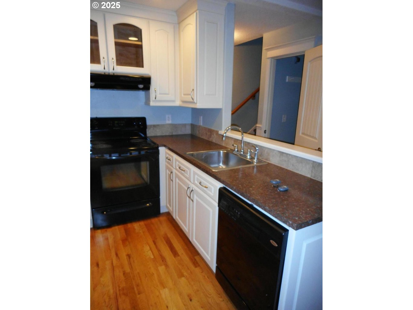 409 Evergreen Avenue Garibaldi, OR 97118 - Photo 46 of 48 a kitchen with stainless steel appliances granite countertop a sink and a stove
