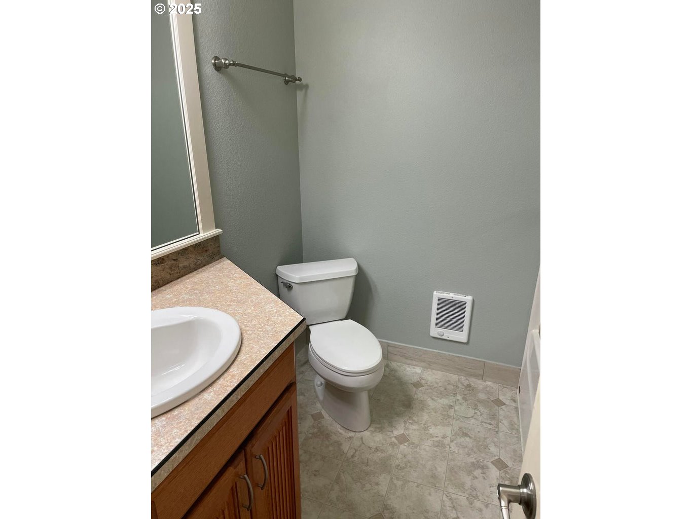 409 Evergreen Avenue Garibaldi, OR 97118 - Photo 10 of 48 a bathroom with a sink and a toilet