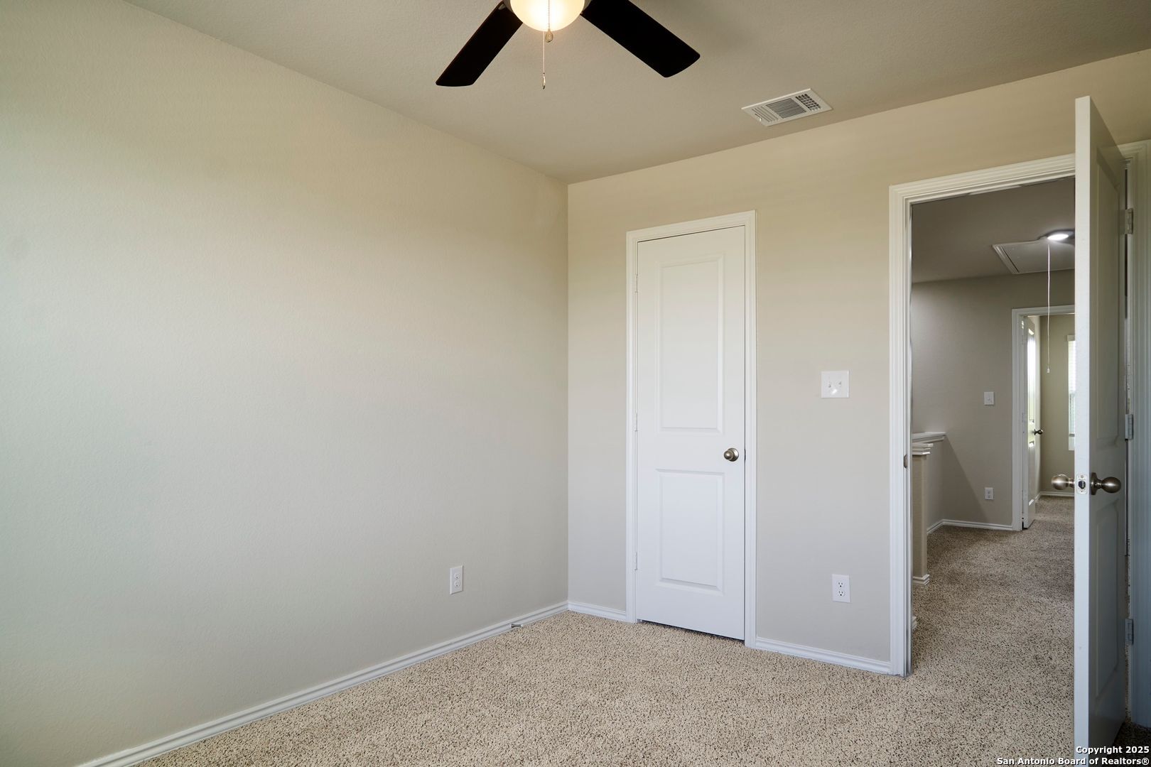 482 Abigail Alley San Antonio, TX 78253 - Photo 13 of 27 an empty room with ceiling fan and window