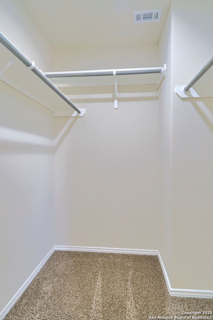 482 Abigail Alley San Antonio, TX 78253 - Photo 18 of 27 a view of small space with racks on the wall