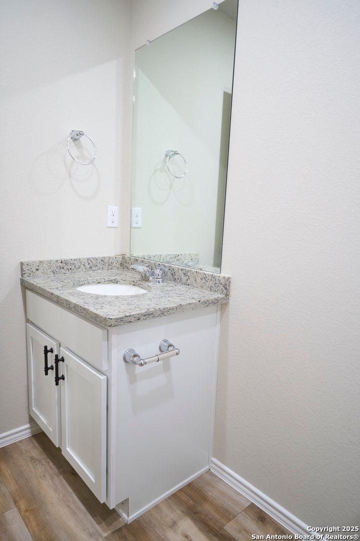 482 Abigail Alley San Antonio, TX 78253 - Photo 19 of 27 a view of bathroom with dual sinks