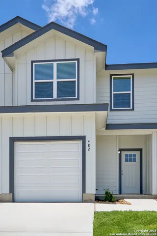 a black and white building with a outdoor space