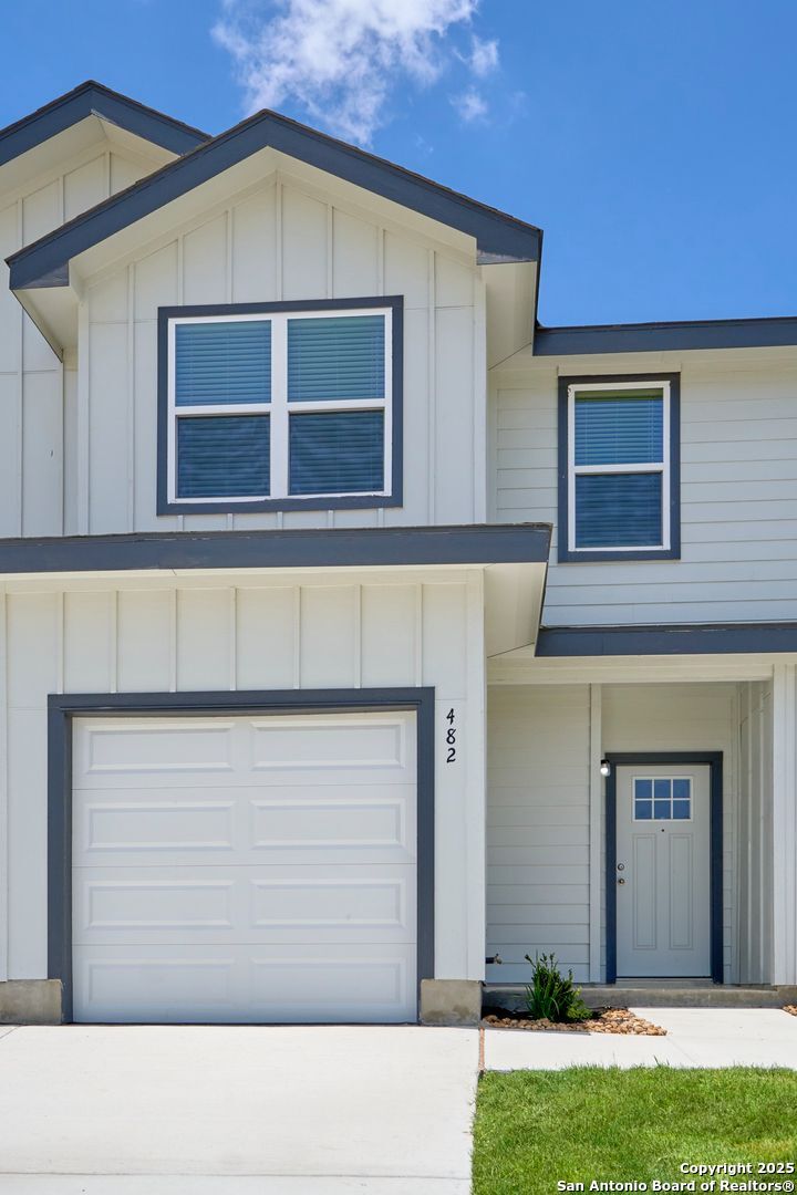 482 Abigail Alley San Antonio, TX 78253 - Photo 3 of 27 a black and white building with a outdoor space