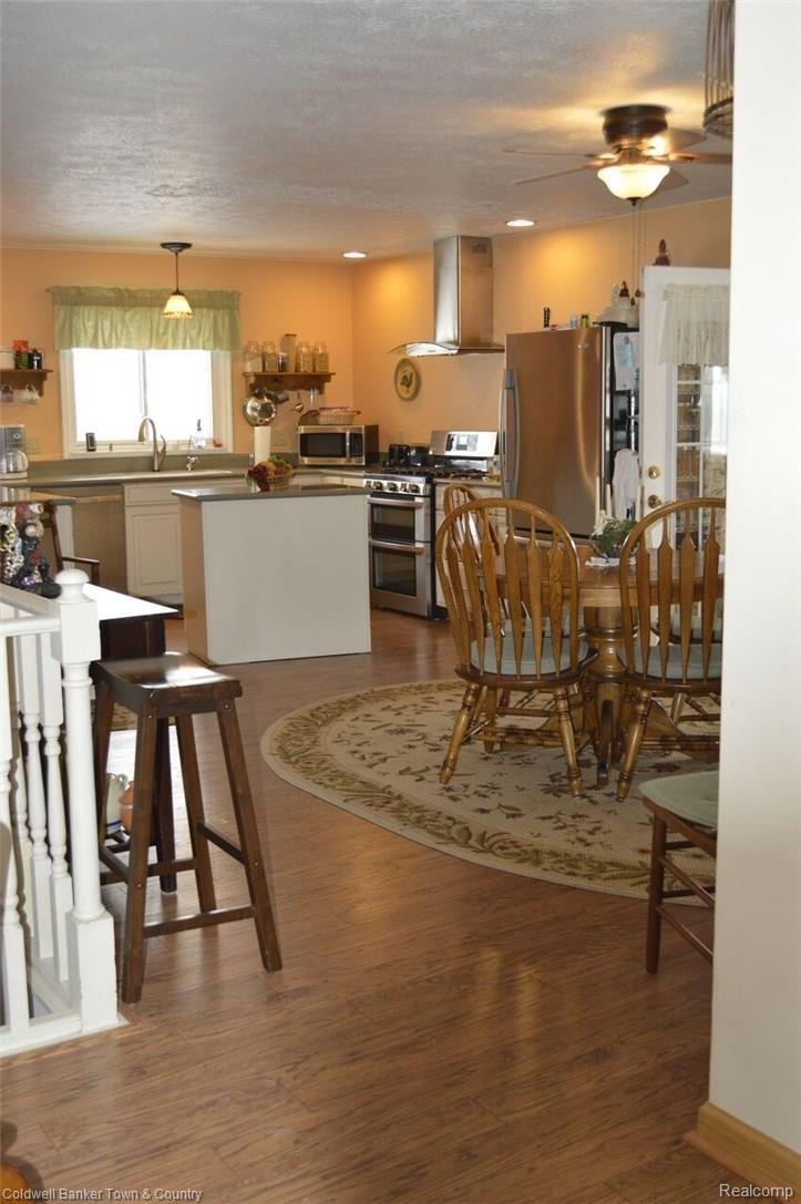 9797 Van Buren Road Fowlerville, MI 48836 - Photo 16 of 56 DINING AND KITCHEN AREA FROM LIVING ROOM. ALL OPEN!